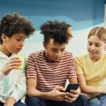 children looking at smart phones sex trafficking prevention